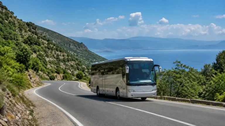 Intercity bus traveling from Skopje toward Ohrid through the North Macedonian mountain landscape